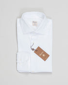 This white casual Slimline jersey shirt is made of polyamide and elastane. The shirt is detailed with mother of pearl buttons, single cuffs and a cut away collar.
Composition: 73% Polyamide 27% Elastan
Article: 8407118269
Color: 000 / White
Slimline