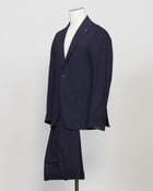 Composition: 53% Linen 39% Virgin wool 8% Mohair
Modello: Monte Carlo / 2SMC22K01
Color: Navy / B3075
Unconstructed shoulder
Unlined
2 Buttons
Notch lapel
Patch pockets
Side vents
Flat front trousers
Belt loops
Slanted side pockets
2 back pockets
Made in Martina Franca, Italy Tagliatore Linen Wool & Mohair Suit / Navy