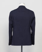 Composition: 53% Linen 39% Virgin wool 8% Mohair
Modello: Monte Carlo / 2SMC22K01
Color: Navy / B3075
Unconstructed shoulder
Unlined
2 Buttons
Notch lapel
Patch pockets
Side vents
Flat front trousers
Belt loops
Slanted side pockets
2 back pockets
Made in Martina Franca, Italy Tagliatore Linen Wool & Mohair Suit / Navy