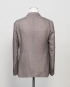 Naturally stretching double breasted hopsack jersey jacket. Crafted in Martina Franca, Italy by Tagliatore.
Natural stretch hopsack jersey jacket
Composition: 72% Silk 28% Virgin wool
Article: 440038 U
Modello: G- WARNER2DK PE
Color: Beige / T3167
Unconstructed
Unlined
Double breasted
Peak lapel
Patch pockets
Side vents
Made in Martina Franca, Italy