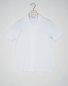 <div>Elevate your resort look with the Gran Sasso Sponge Camp Collar Shirt. Crafted with a unique sponge fabric, this light brown shirt offers a sophisticated and relaxed style. Perfect for any getaway, this shirt adds a touch of luxury to your travel wardrobe.</div> <ul> <li>Composition: 100% Cotton</li> <li>Color: 001 / White</li> <li>Article: 60199 / 79801</li> <li>Made in Italy</li> </ul>