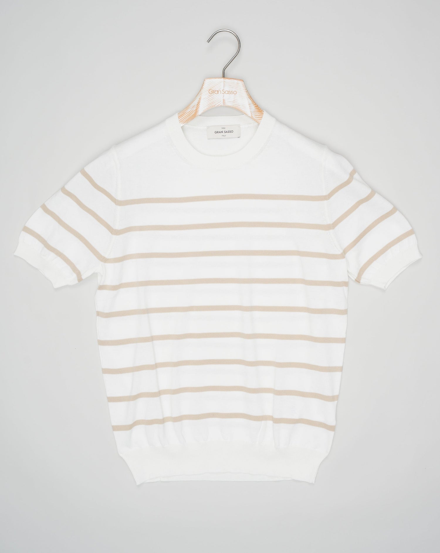 <ul> <li>Composition: 100% Organic Cotton</li> <li>Color: 005 / Off White & Beige</li> <li>Article: 57151 / 18030</li> <li>Made in Italy</li> </ul> Gran Sasso Striped Cotton T-Shirt / Off White