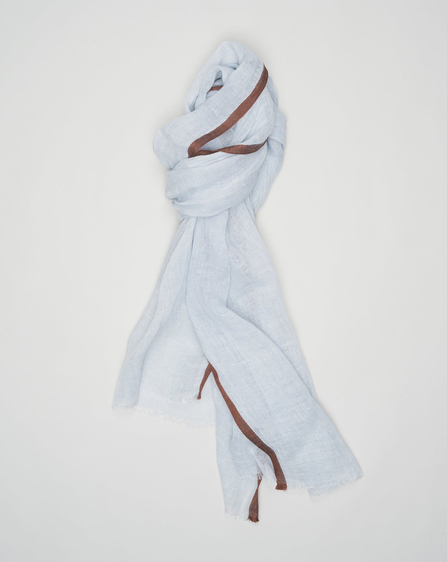 <ul> <li>Composition: 99% Linen 1% Viscose</li> <li>Color: 05 / Light Blue & Brown</li> <li>Size: 184 cm x 70cm Altea Linen Scarf / Light Blue & Brown</li> </ul>