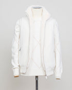 Fisherman's rib 3-ply pure cashmere sleeveless jacket. The metal zippers add a modern, functional touch. The faux fur lining provides warmth and comfort, making it ideal for colder days. The side pockets complete the stylish and practical design.
Outer composition: 100% cashmere
Inner composition: 100% Faux fur
Zipped side pockets
Two-way zipper
Art 23144 15581
Col 001 Cream White
Regular fit
Made in Italy Gran Sasso Eco-Fur & Cashmere Ribbed Vest / White