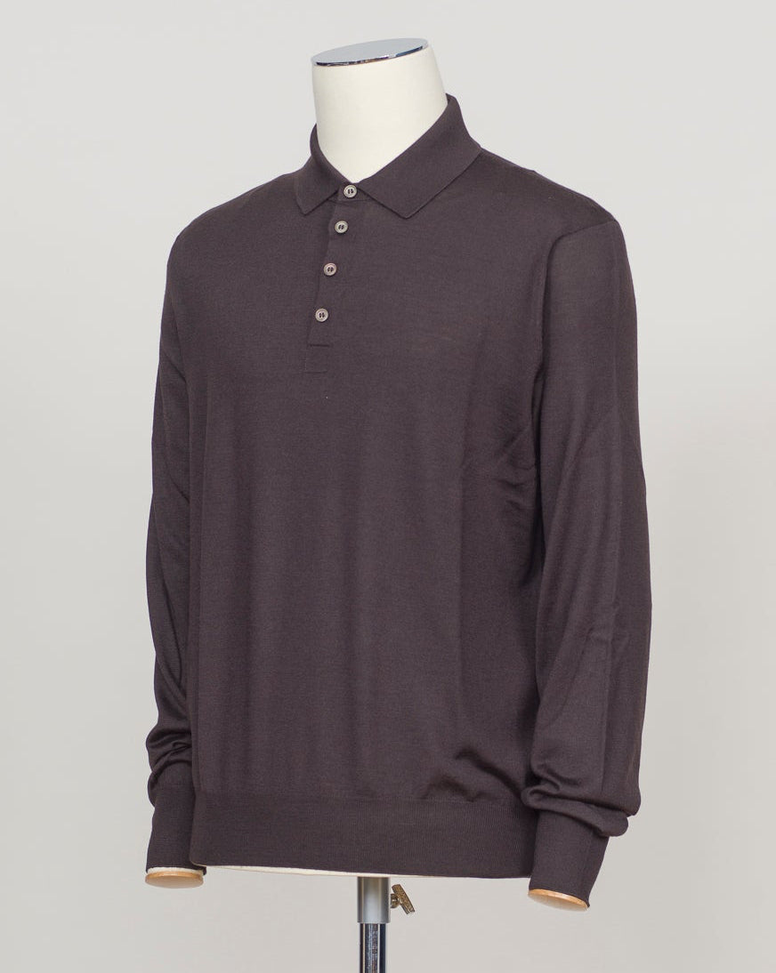 A refined three-ply knit polo crafted from a luxurious blend of merino wool, cashmere, and silk. The dark brown tone offers versatility across seasons, while the natural fiber composition ensures breathability and a subtle sheen. Designed for the discerning wearer who values both comfort and understated elegance. Gran Sasso Wool Cashmere & Silk Polo / Dark Brown