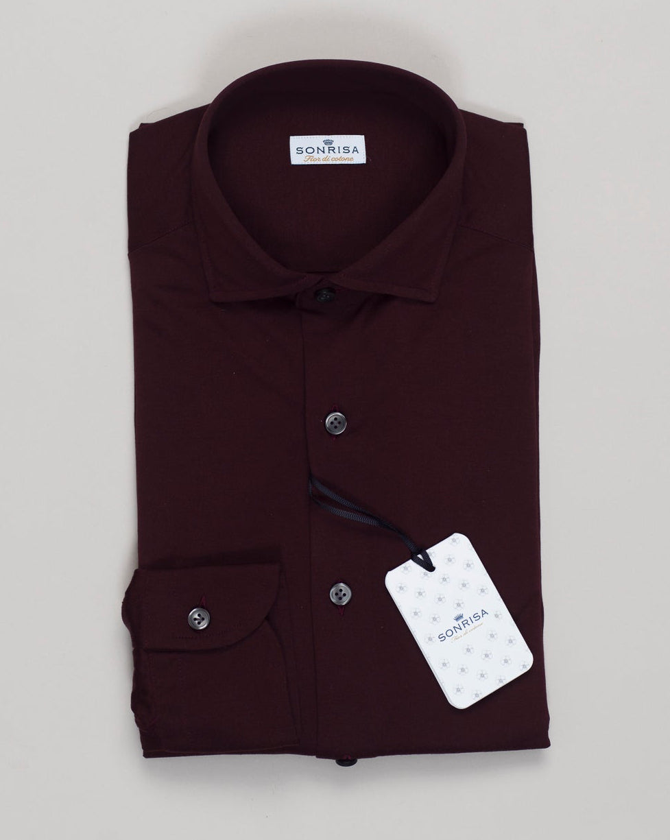 Effortless elegance in premium cotton jersey. The Sonrisa shirt moves with you—soft, breathable, and refined for everyday sophistication. Rich burgundy completes any wardrobe foundation. Sonrisa Cotton Jersey Shirt / Burgundy