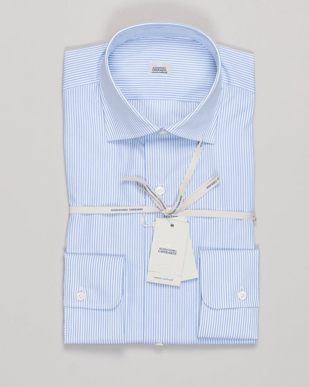 Classic pencil-striped shirt in crisp blue and white, tailored for refined everyday wear. Alessandro Gherardi's signature construction delivers sharp lines and enduring style. Premium cotton blend ensures comfort through season after season. Alessandro Gherardi Pencil Stripe Shirt / Blue & White