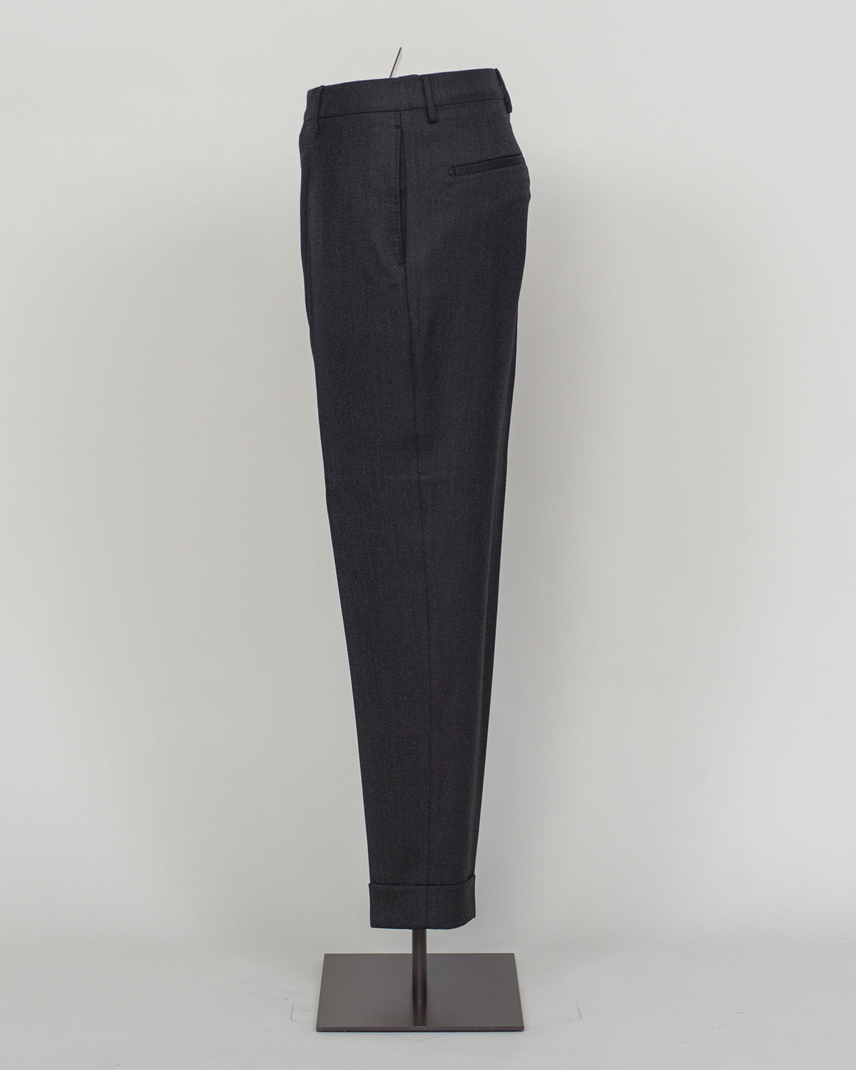 Berwich's Chiaia represents timeless tailoring craftsmanship. These wool covert trousers are cut from premium wool in classic black, designed for refined simplicity and enduring wear. The structured fabric offers subtle texture while maintaining elegance across seasons. A sophisticated foundation for curated wardrobes and versatile pairing with blazers, knitwear, and formal wear.
