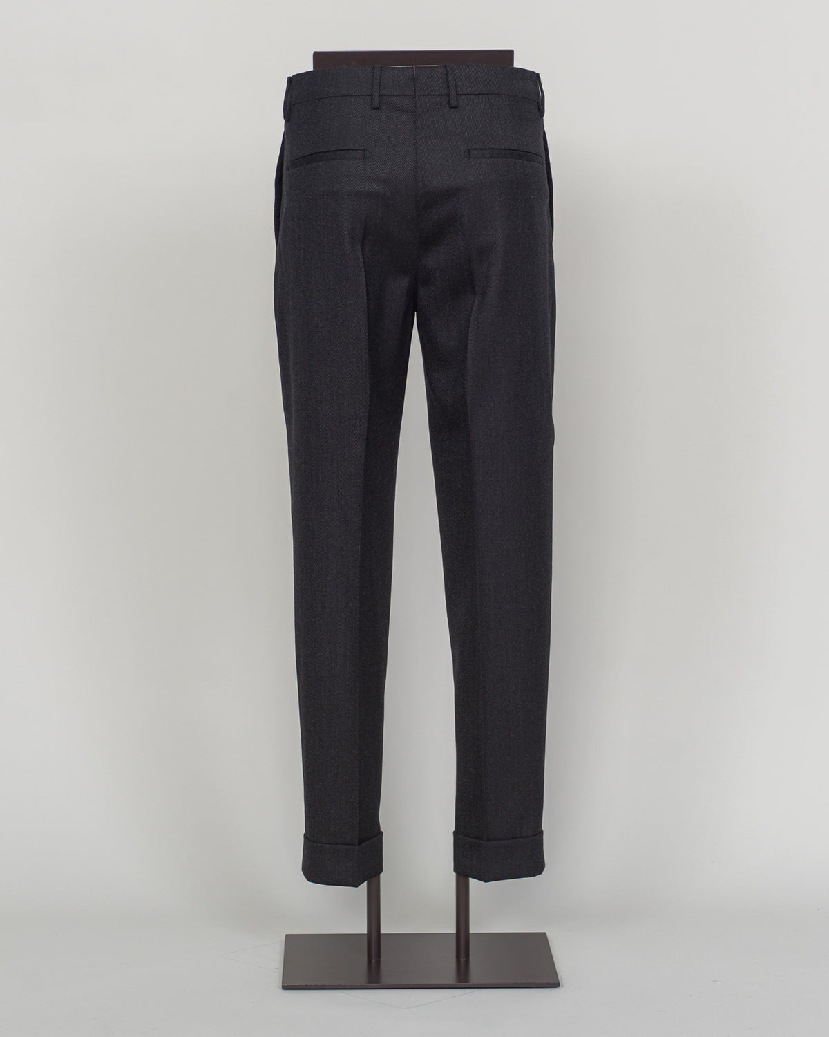 Berwich's Chiaia represents timeless tailoring craftsmanship. These wool covert trousers are cut from premium wool in classic black, designed for refined simplicity and enduring wear. The structured fabric offers subtle texture while maintaining elegance across seasons. A sophisticated foundation for curated wardrobes and versatile pairing with blazers, knitwear, and formal wear.