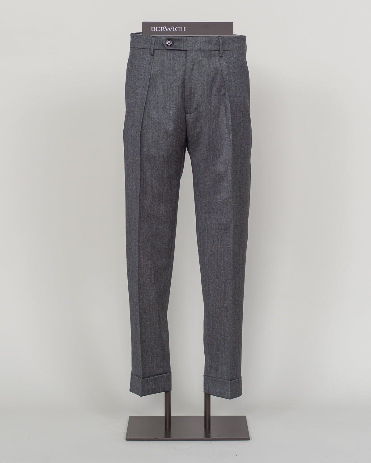 Italian tailoring meets contemporary comfort in these Berwich Chiaia trousers. Crafted from long-staple wool with subtle stretch, they drape with precision while moving with you. Grey provides versatile elegance across seasons. A refined foundation for tailored wardrobes.