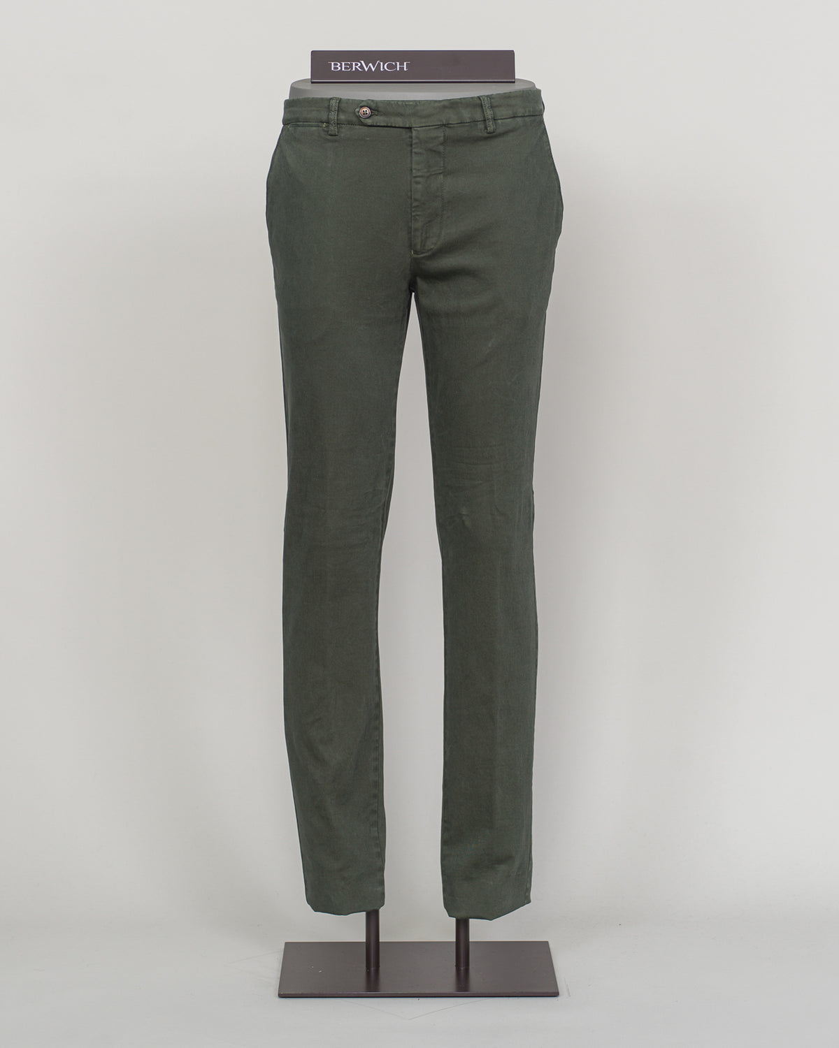 Berwich's Vulcano chinos exemplify Italian craftsmanship with their garment-dyed verde hue, delivering depth and character that evolves with wear. Cut in a refined, contemporary fit, these chinos balance structure with comfort—ideal for refined casual dressing and smart-casual occasions. The garment-dye process ensures each pair develops its own patina, making them a versatile investment piece for a discerning wardrobe. Pair with lightweight knitwear or classic shirting for effortless sophistication.
