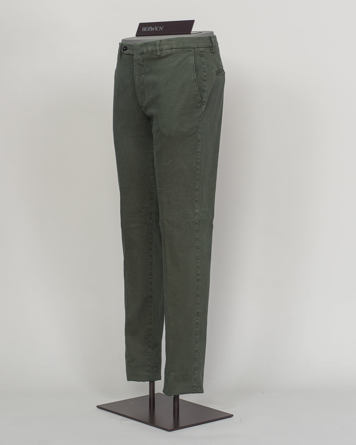 Berwich's Vulcano chinos exemplify Italian craftsmanship with their garment-dyed verde hue, delivering depth and character that evolves with wear. Cut in a refined, contemporary fit, these chinos balance structure with comfort—ideal for refined casual dressing and smart-casual occasions. The garment-dye process ensures each pair develops its own patina, making them a versatile investment piece for a discerning wardrobe. Pair with lightweight knitwear or classic shirting for effortless sophistication.