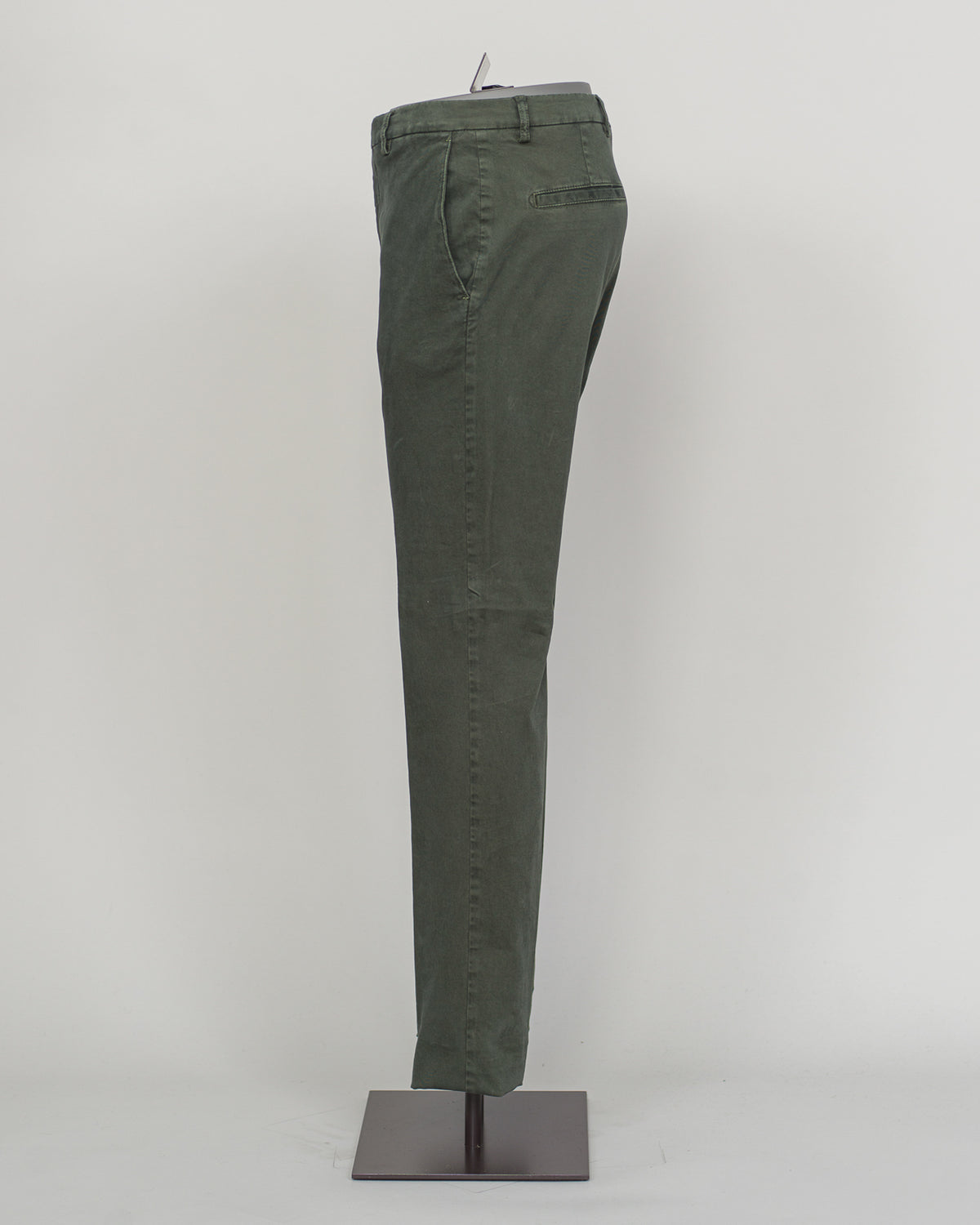 Berwich's Vulcano chinos exemplify Italian craftsmanship with their garment-dyed verde hue, delivering depth and character that evolves with wear. Cut in a refined, contemporary fit, these chinos balance structure with comfort—ideal for refined casual dressing and smart-casual occasions. The garment-dye process ensures each pair develops its own patina, making them a versatile investment piece for a discerning wardrobe. Pair with lightweight knitwear or classic shirting for effortless sophistication.