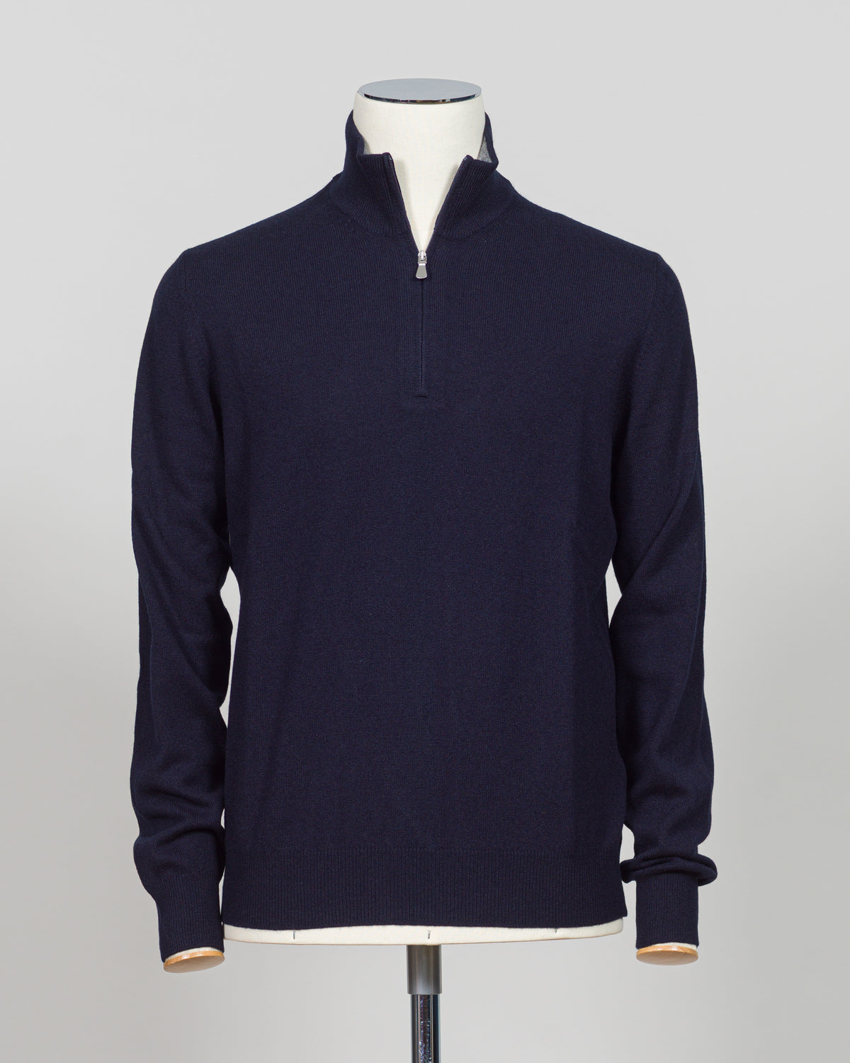 Elevate your everyday layering with this essential half-zip knit from Gran Sasso. Crafted from premium Italian yarn, the navy colorway offers versatility across seasons and occasions. The half-zip silhouette provides adaptable warmth, while the refined construction delivers the understated luxury Gran Sasso is known for. Perfect for layering beneath tailored blazers or wearing standalone with dress trousers.