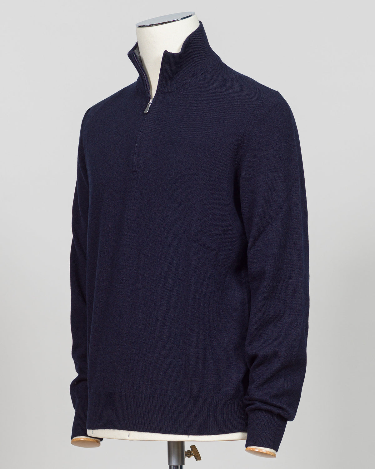 Elevate your everyday layering with this essential half-zip knit from Gran Sasso. Crafted from premium Italian yarn, the navy colorway offers versatility across seasons and occasions. The half-zip silhouette provides adaptable warmth, while the refined construction delivers the understated luxury Gran Sasso is known for. Perfect for layering beneath tailored blazers or wearing standalone with dress trousers. Gran Sasso Half-Zip Knit / Navy