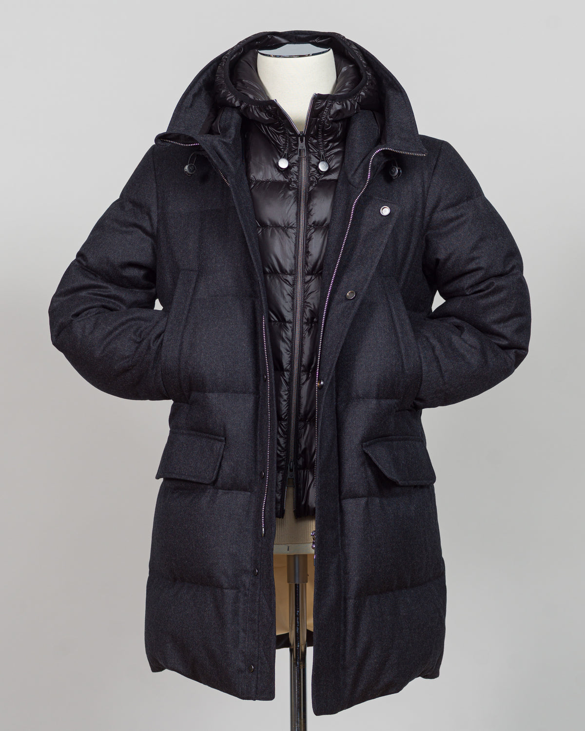 The Montecore VBC Flannel Down Coat delivers refined warmth with understated sophistication. Crafted from premium VBC flannel in deep charcoal grey, this jacket balances structure and comfort for versatile layering across seasons.
Filled with responsibly sourced down insulation, it provides exceptional thermal efficiency without excess bulk. The classic silhouette suits tailored wardrobes—layer it over dress shirts for office wear or pair casually with knitwear for weekend elegance.
VBC's heritage Italian