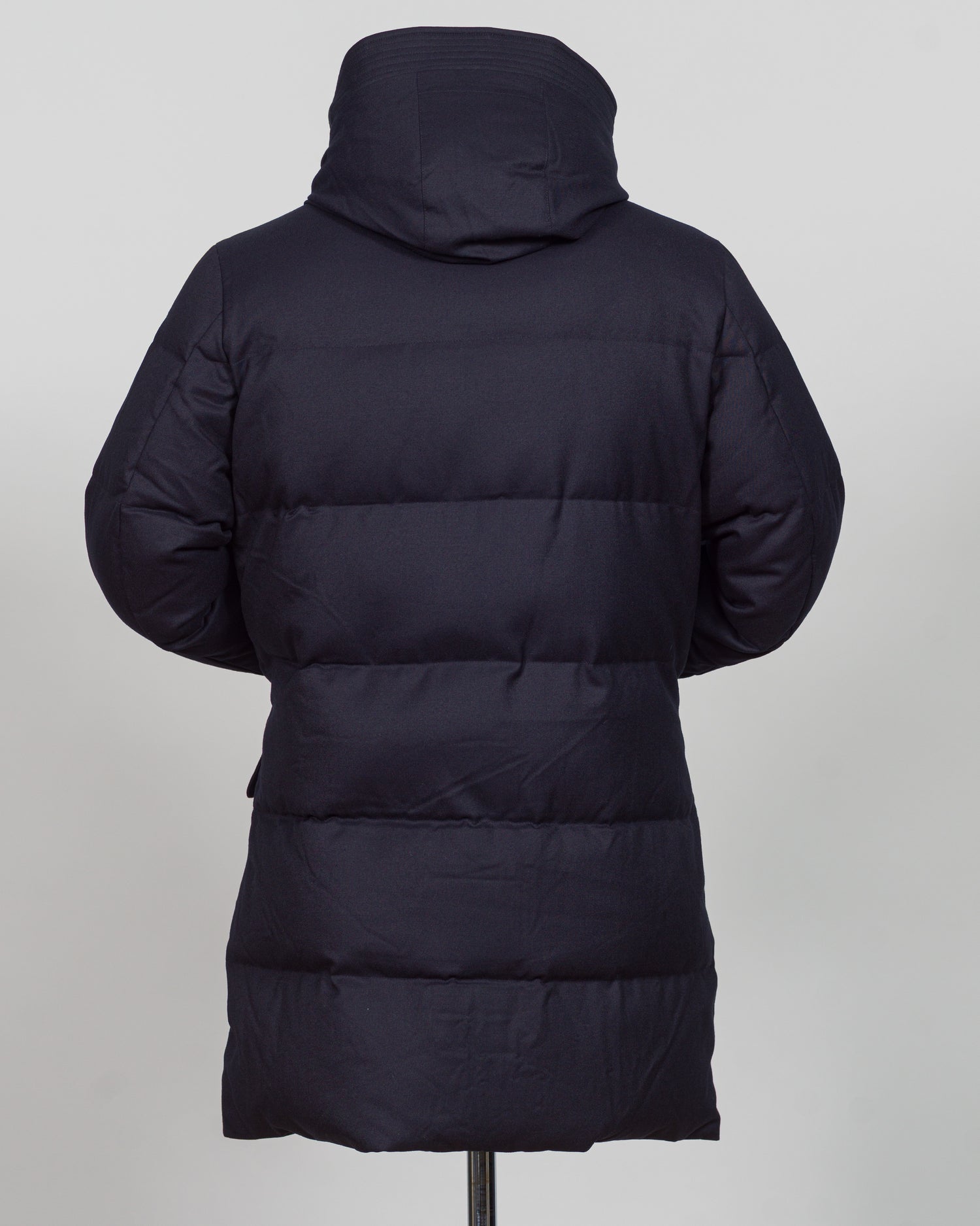 The Montecore VBC Flannel Down Coat delivers refined warmth with understated sophistication. Crafted from premium VBC flannel in navy, this jacket balances structure and comfort for versatile layering across seasons.
Filled with responsibly sourced down insulation, it provides exceptional thermal efficiency without excess bulk. The classic silhouette suits tailored wardrobes—layer it over dress shirts for office wear or pair casually with knitwear for weekend elegance.
VBC's heritage Italian mills ensure