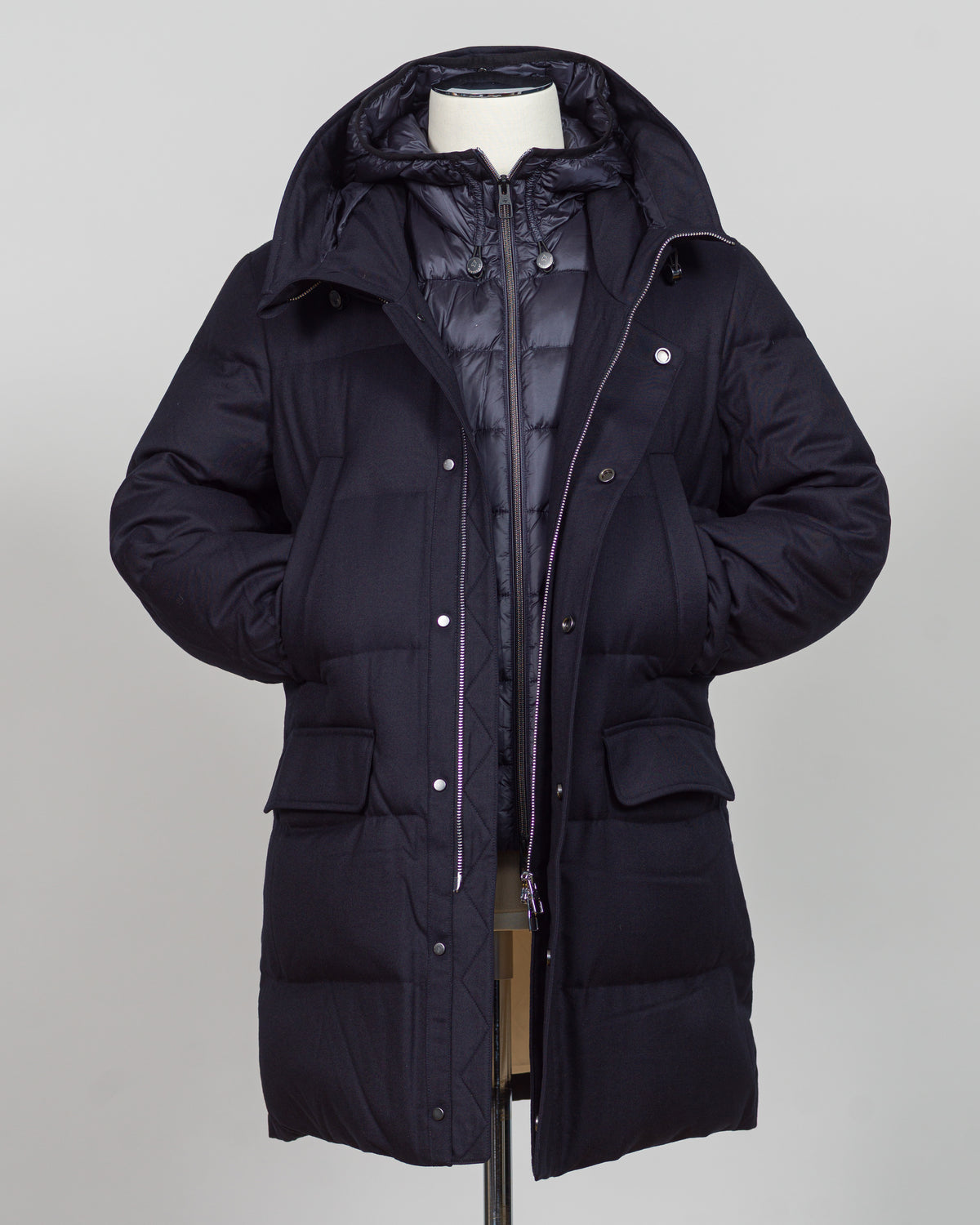 The Montecore VBC Flannel Down Coat delivers refined warmth with understated sophistication. Crafted from premium VBC flannel in navy, this jacket balances structure and comfort for versatile layering across seasons.
Filled with responsibly sourced down insulation, it provides exceptional thermal efficiency without excess bulk. The classic silhouette suits tailored wardrobes—layer it over dress shirts for office wear or pair casually with knitwear for weekend elegance.
VBC's heritage Italian mills ensure