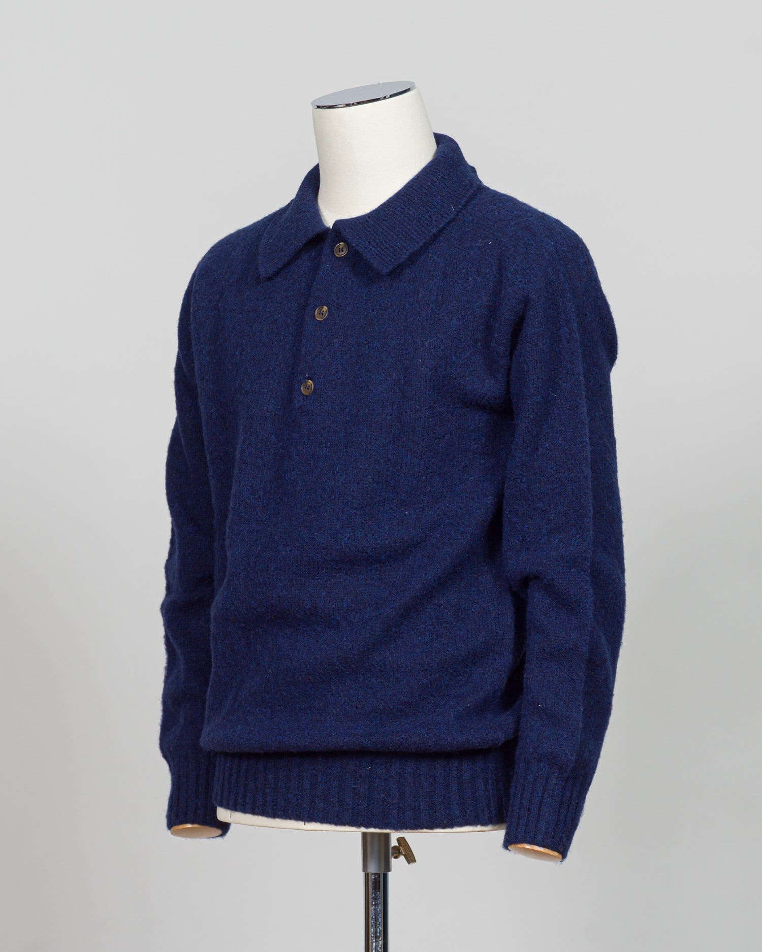 Crafted from luxurious shaggy wool, this Harley of Scotland polo combines traditional Scottish heritage with refined versatility. The textured knit delivers exceptional softness and warmth. Perfect for layering or wearing standalone, it transitions seamlessly from casual weekends to smart-casual occasions. The structured polo collar and quality construction ensure lasting appeal season after season.