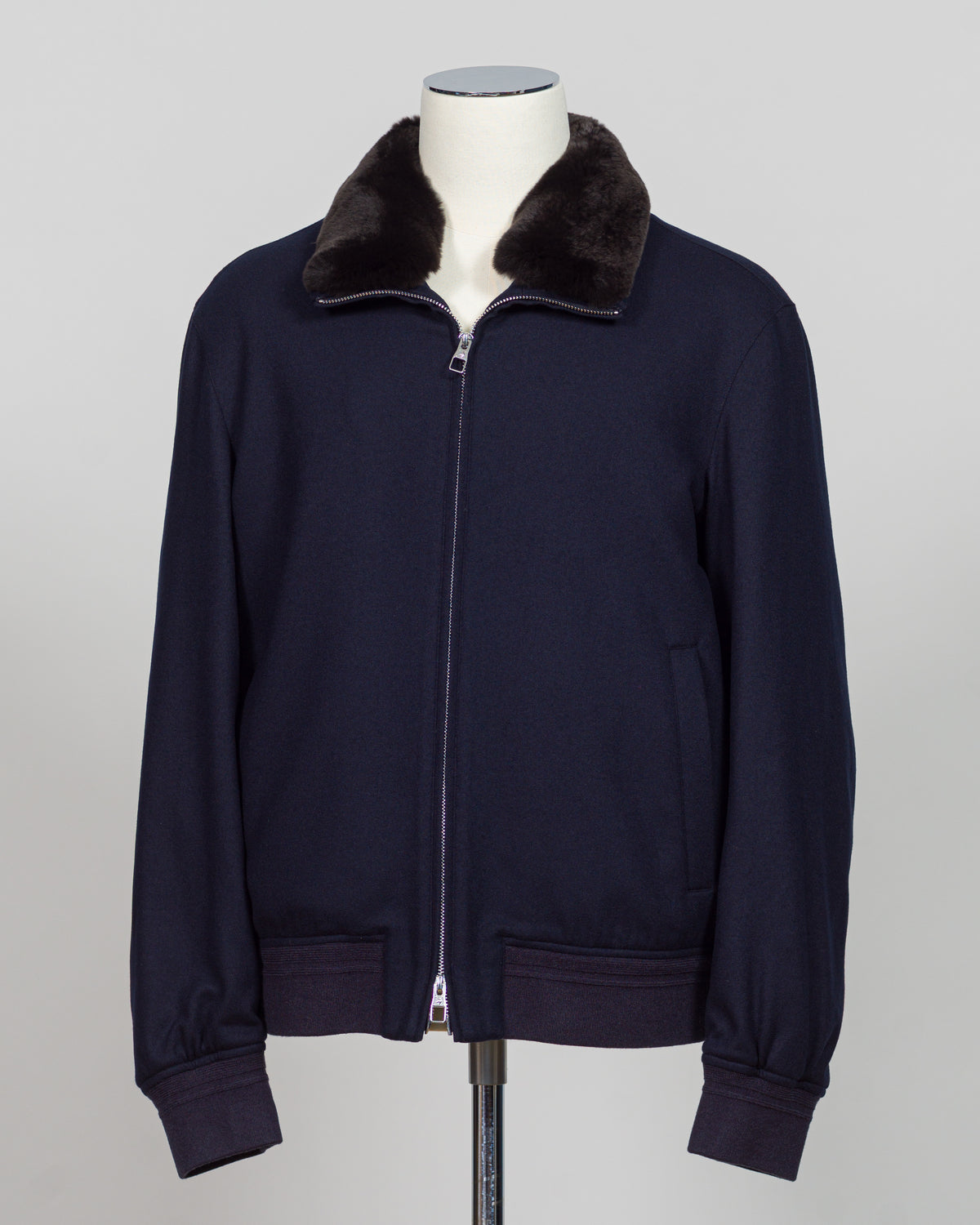 The Montecore Blouson Jacket exemplifies modern tailoring with its refined silhouette and versatile navy colorway. Crafted from premium materials, this blouson delivers structured elegance suitable for both professional and refined casual settings.
The jacket features a contemporary fit that balances comfort with polished aesthetics. Its streamlined design works seamlessly layered over knitwear or worn as a standalone piece, making it an essential addition to a curated wardrobe.
Ideal for the discerning g