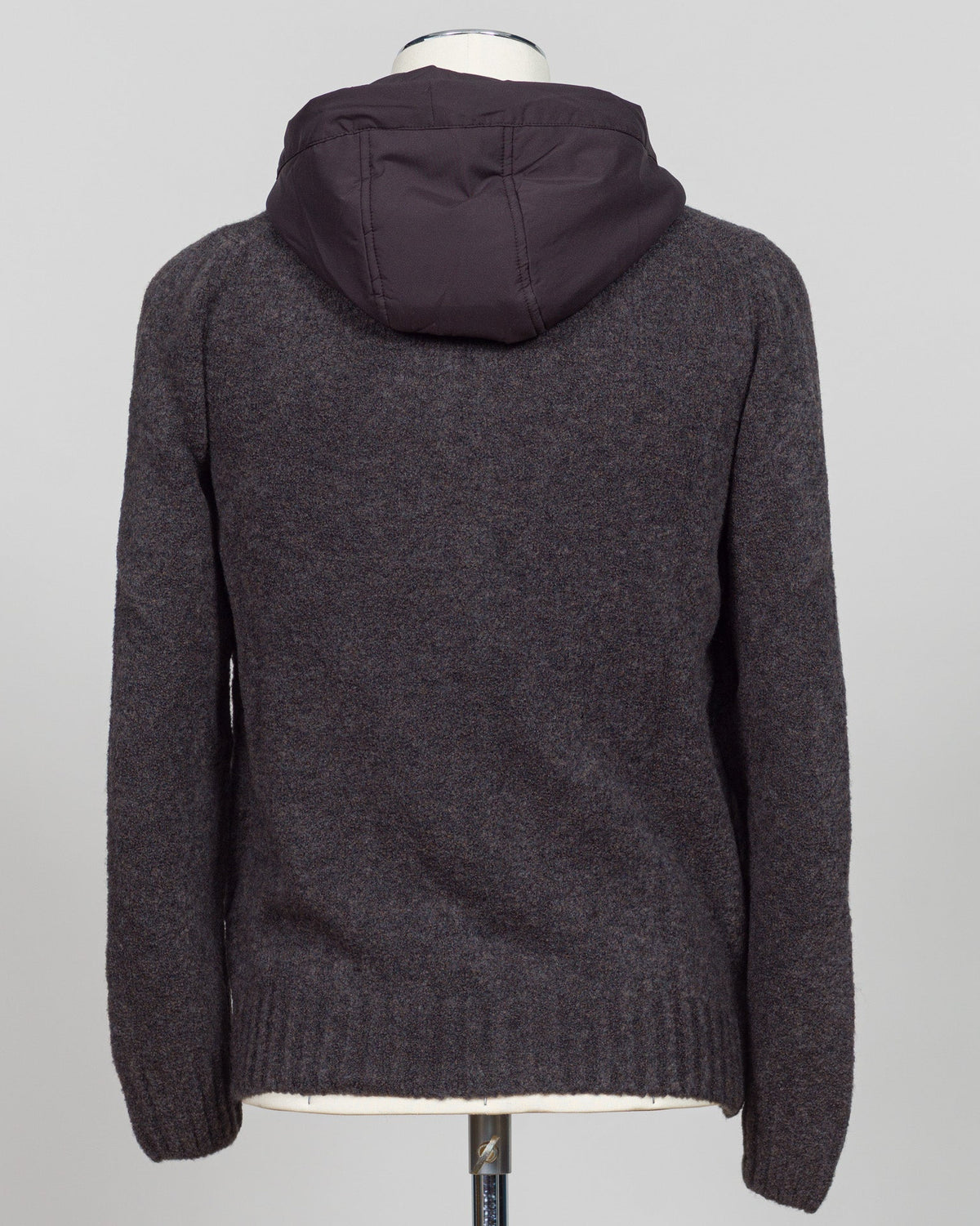 Luxurious bouclé hoodie in rich brown. Full-zip construction with a soft, textured knit that defines effortless sophistication. Perfect for layering or standalone wear. Italian craftsmanship meets contemporary comfort—a premium essential for the discerning wardrobe. Gran Sasso Full-Zip Bouclé Hoodie / Brown