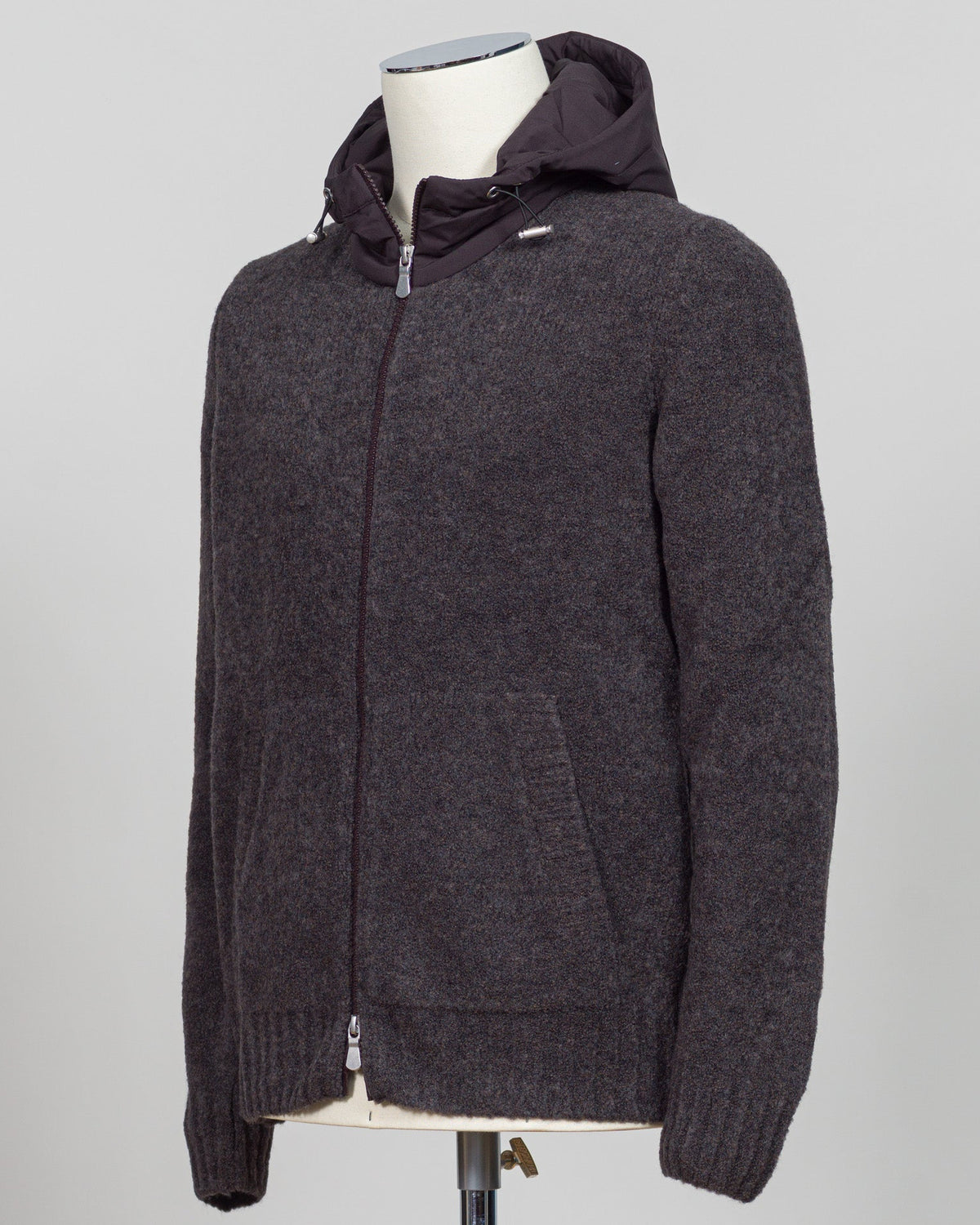 Luxurious bouclé hoodie in rich brown. Full-zip construction with a soft, textured knit that defines effortless sophistication. Perfect for layering or standalone wear. Italian craftsmanship meets contemporary comfort—a premium essential for the discerning wardrobe. Gran Sasso Full-Zip Bouclé Hoodie / Brown