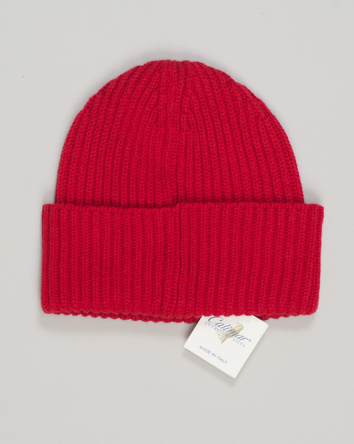 A luxurious beanie crafted from pure cashmere in a rich red tone. Designed for understated elegance and warmth, this essential piece complements any wardrobe with its refined simplicity. The soft, breathable construction ensures comfort across seasons, making it a versatile addition to everyday wear and travel. Perfect for the discerning individual seeking quality knitwear that transcends trends. Calimar Cashmere Beanie / Red