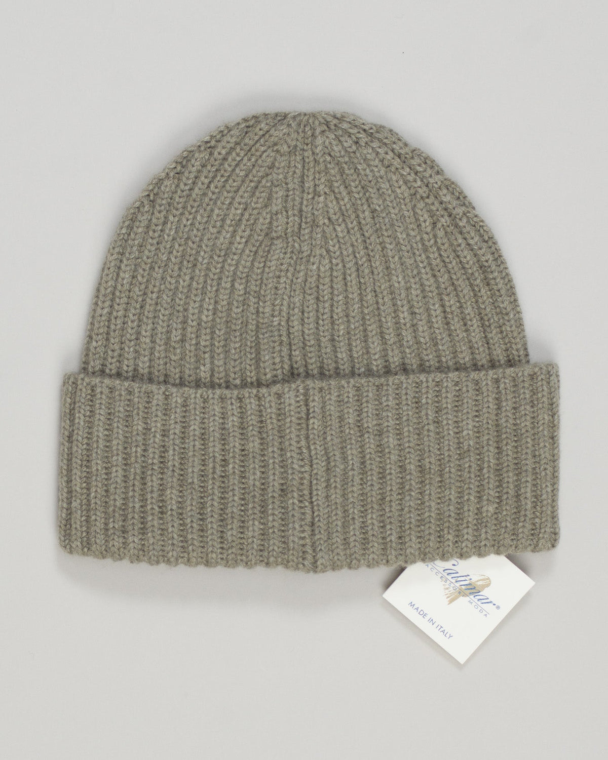 Pure cashmere beanie in a refined indigo hue. Soft, breathable knit that moves with you through seasons. Simple, timeless design that pairs effortlessly with any wardrobe. Lightweight enough for layering or worn alone on cooler days. A luxury essential that transcends trends. Calimar Cashmere Beanie / Indigo