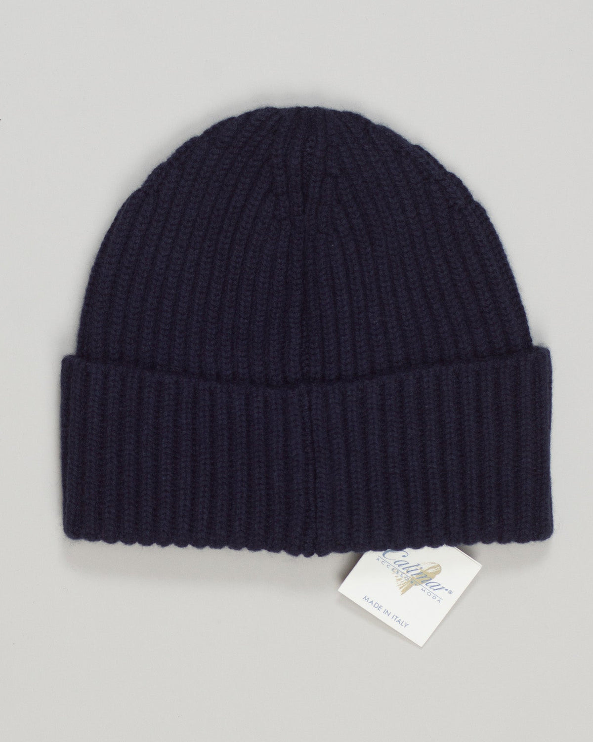 Crafted from pure merino wool, this ribbed beanie delivers exceptional warmth and breathability in a refined navy tone. The close-knit construction resists pilling while maintaining a soft, comfortable feel against skin. Ideal for cool seasons, it pairs effortlessly with any wardrobe. Calimar Ribbed Merino Beanie / Navy