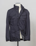 This Herno jacket honors the iconic M65 field jacket. Practical design with quite a few pockets, action back and adjustable waist. Why change the winning team.
Regular fit
Long sleeves
High collar
Covered zip and press-stud fastening
Flap breast pockets
Flap pockets
Inner drawstring at the waist
Adjustable cuffs
FI000111U 13211 9200