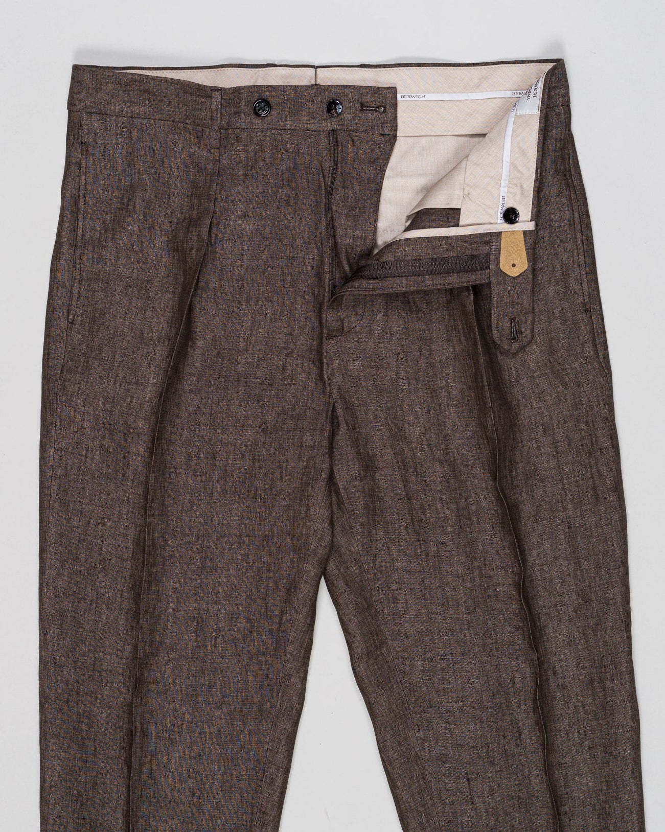 Fabric: Loro Piana Summertime: 71% Virgin wool natural stretch 15% Silk 14% Linen
Model: Chiaia Long
Article: PU19CHIAIALONGLP184U
Color: Brown
Made in Martina Franca, Puglia, Italy Berwich Chiaia Long Loro Piana Summertime Trousers / Brown