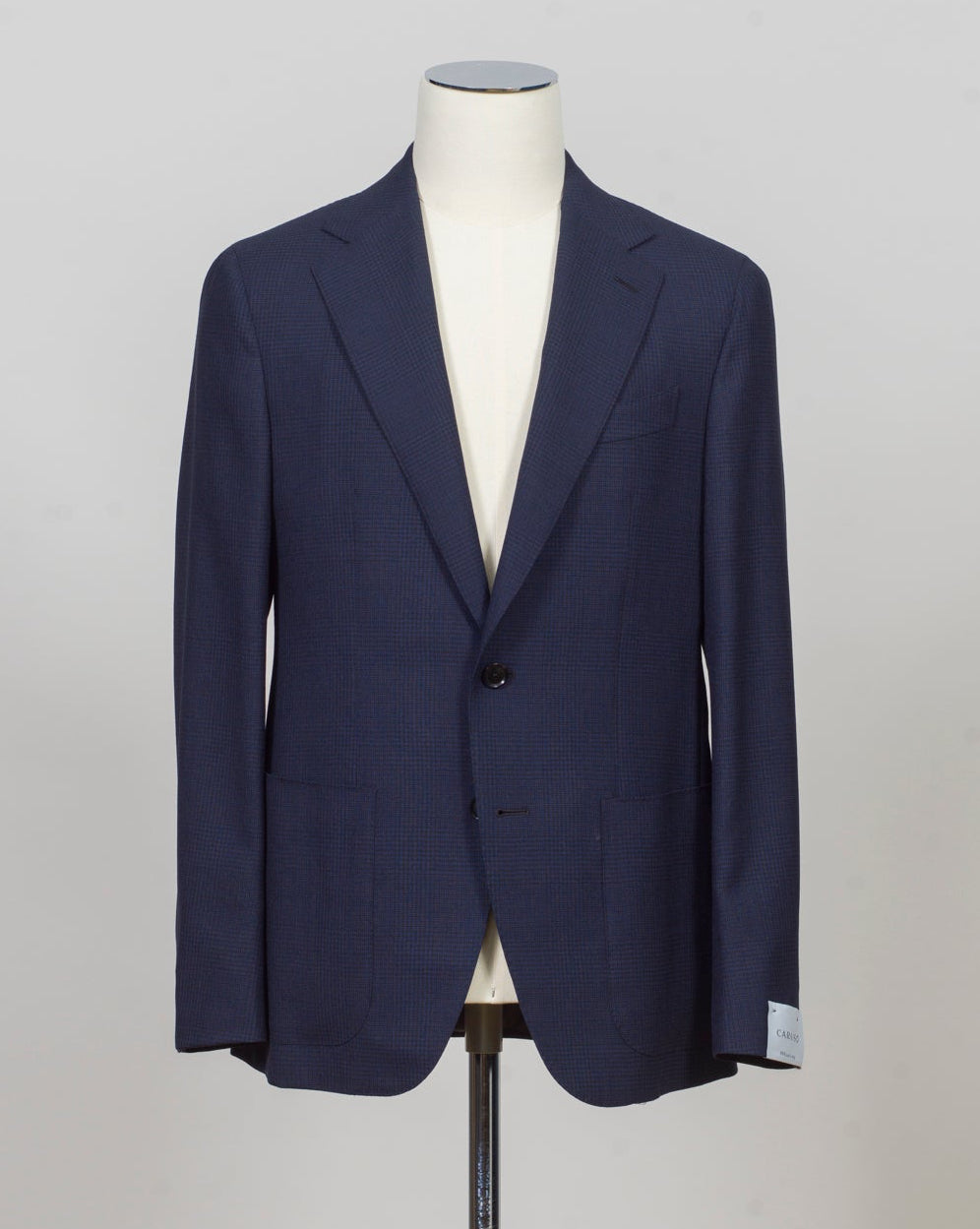 Caruso blazer impeccably tailored in Soragna, Parma, Italy.
Stunning lightness and ease of movement without losing the classic tailored elegance. These are some of the ingredients that make Italian tailoring world famous and you can find it all in Caruso garments.
Beautiful handmade detailing and naturally with a full canvas structure inside.
Model: Aida
Article: 506113
Composition: 100% Wool
Color: 0120 / Navy
2 Patch Pockets
Side vents
Fully Lined
Made in Soragna, Italy
Caruso Glen