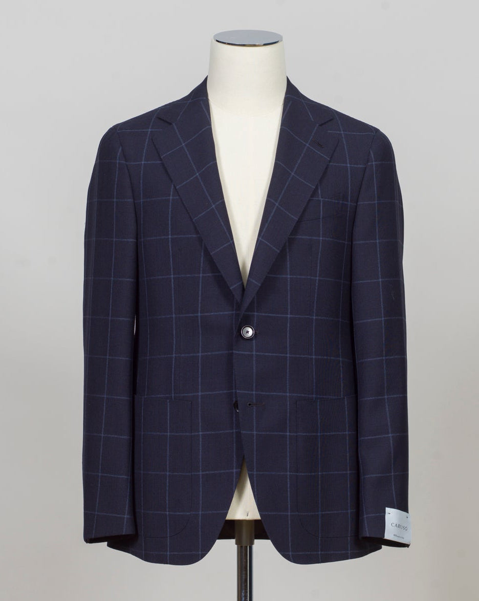 Caruso blazer impeccably tailored in Soragna, Parma, Italy.
Stunning lightness and ease of movement without losing the classic tailored elegance. These are some of the ingredients that make Italian tailoring world famous and you can find it all in Caruso garments.
Beautiful handmade detailing and naturally with a full canvas structure inside.
Model: Aida
Article: 506432
Composition: 100% Wool
Color: 0120 / Navy
2 Patch Pockets
Side vents
Fully Lined
Made in Soragna, Italy Caruso Wind