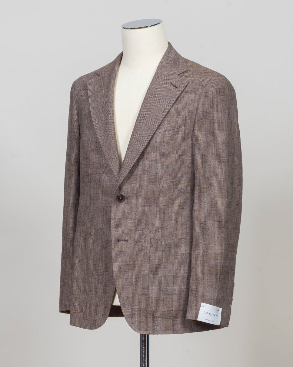 Caruso blazer impeccably tailored in Soragna, Parma, Italy.
Stunning lightness and ease of movement without losing the classic tailored elegance. These are some of the ingredients that make Italian tailoring world famous and you can find it all in Caruso garments.
Beautiful handmade detailing and naturally with a full canvas structure inside.
Model: Aida
Article: 230164
Composition: 40% Silk 37% Linen 17% Cotton 6% Polyamid
Color: 0322 / Brown
2 Patch Pockets
Side vents
Fully Lined
Made in Sorag