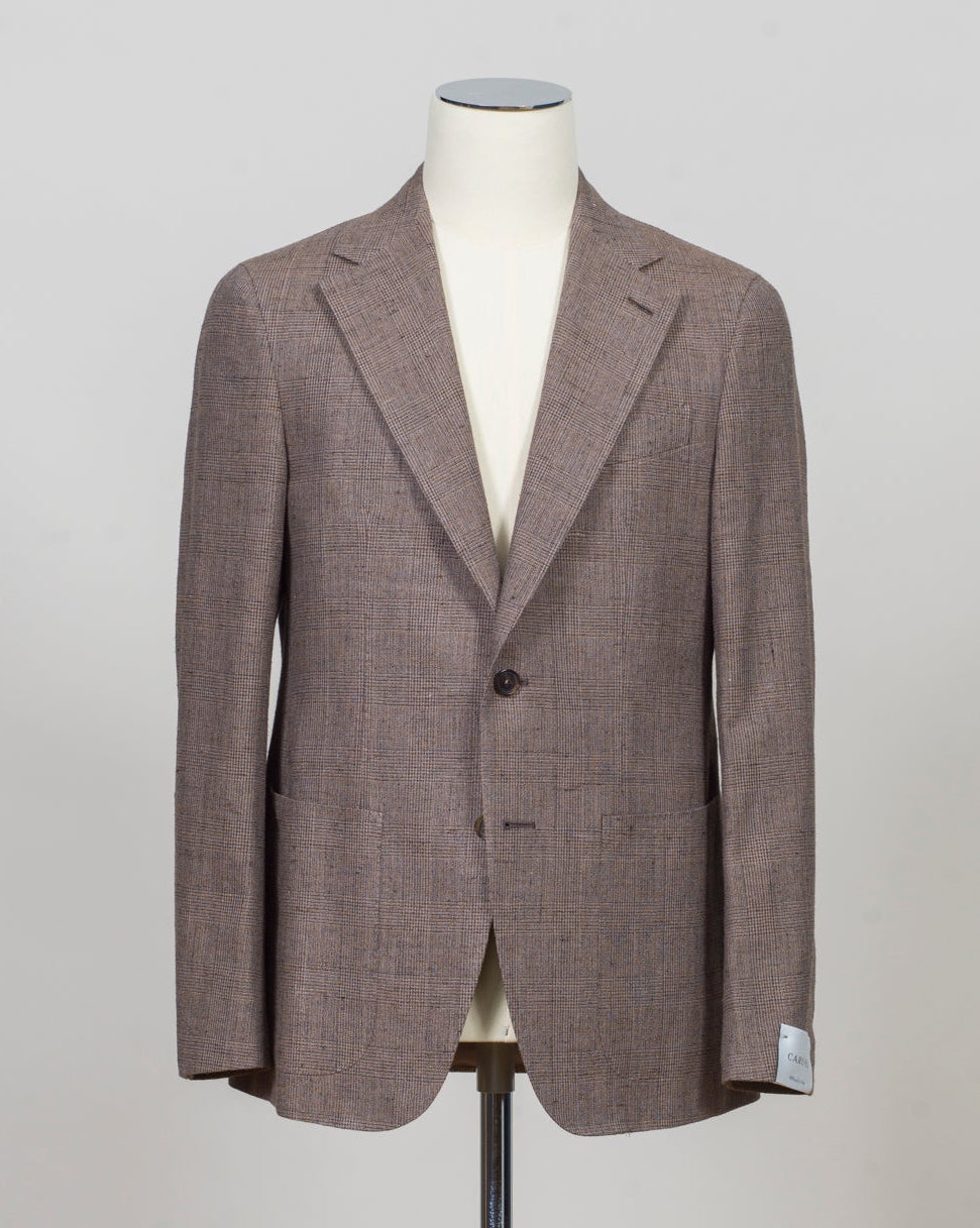 Caruso blazer impeccably tailored in Soragna, Parma, Italy.
Stunning lightness and ease of movement without losing the classic tailored elegance. These are some of the ingredients that make Italian tailoring world famous and you can find it all in Caruso garments.
Beautiful handmade detailing and naturally with a full canvas structure inside.
Model: Aida
Article: 230164
Composition: 40% Silk 37% Linen 17% Cotton 6% Polyamid
Color: 0322 / Brown
2 Patch Pockets
Side vents
Fully Lined
Made in Sorag