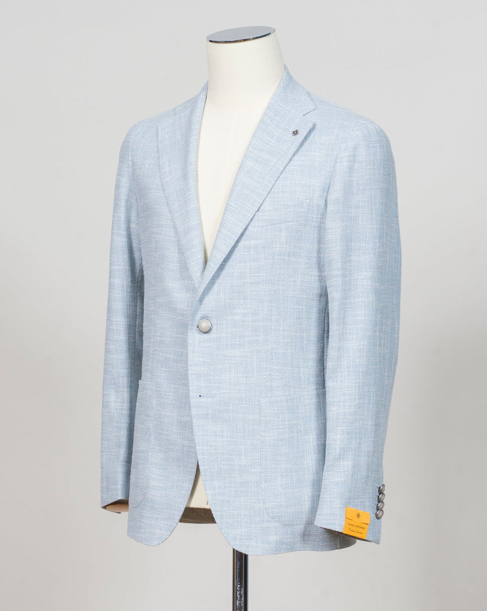 Single breasted
Notch lapels
Welted chest pocket
Patch side pockets
Unconstructed shoulder
Unlined
4 sleeve buttons
Model: 1SHO22KK--
Art. C90057 U
Col EI919
48% virgin wool, 24% silk, 20% cotton, 5% polyamide, 3% elastane
Made in Italy Tagliatore Hopsack Jacket / Light Blue