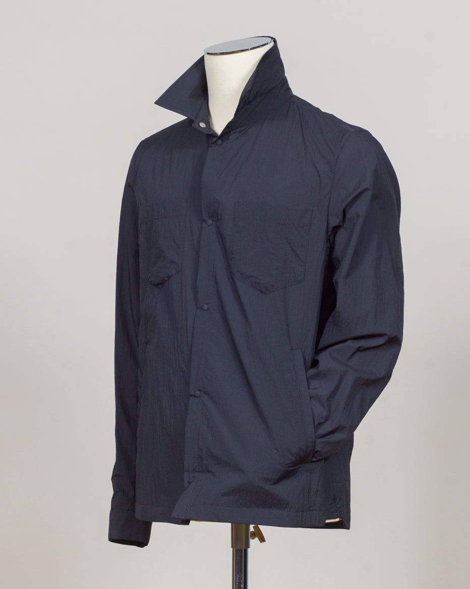 Snap button fastening
Slanted side pockets
Patch pockets on chest
Article: GI000646U 12865
Color: 9200 / Navy Herno Nylon Shirt Jacket / Navy
Made in Italy