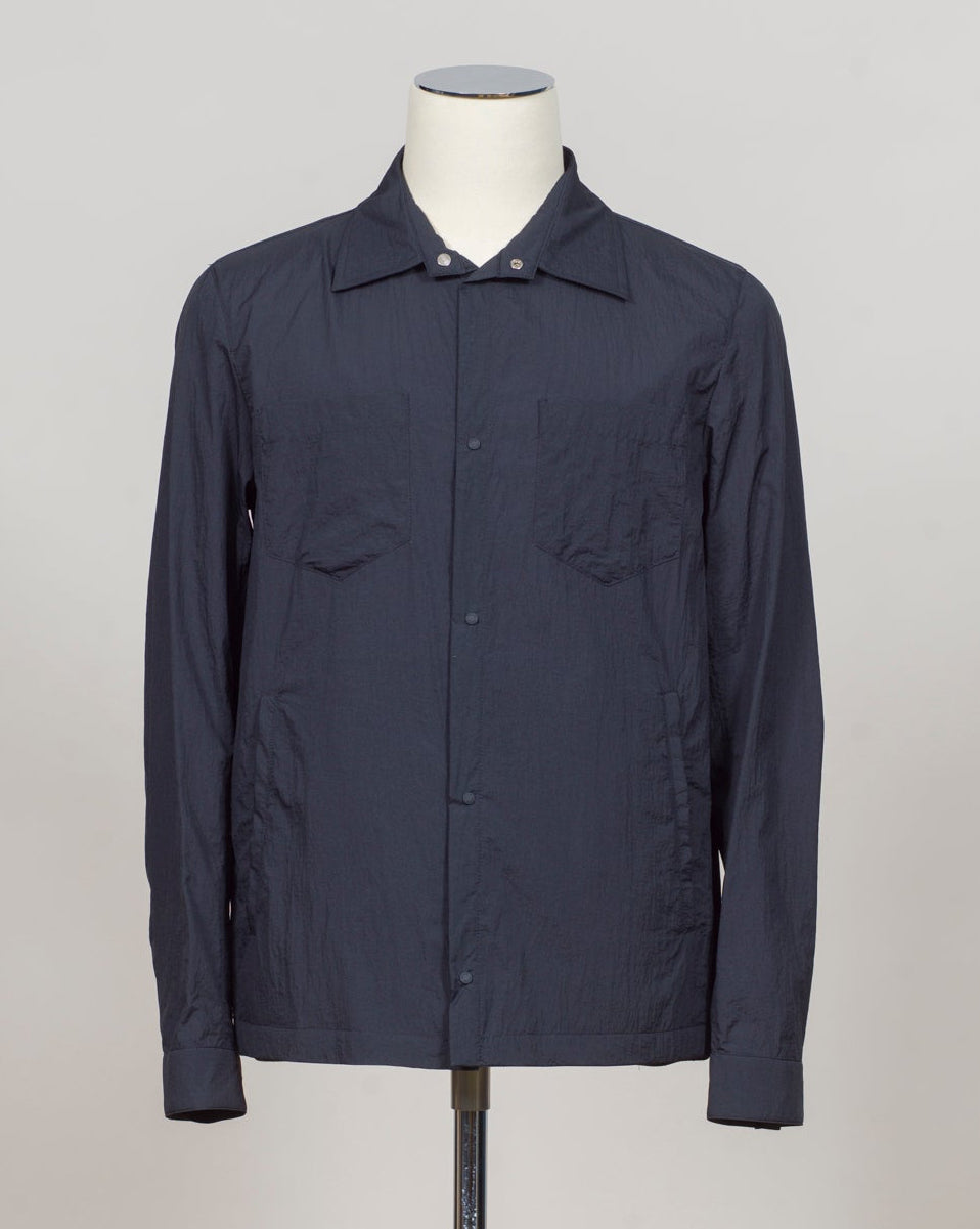 Snap button fastening
Slanted side pockets
Patch pockets on chest
Article: GI000646U 12865
Color: 9200 / Navy Herno Nylon Shirt Jacket / Navy
Made in Italy