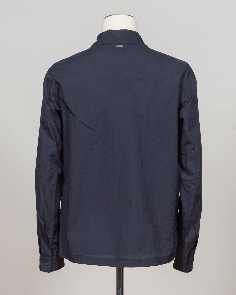Snap button fastening
Slanted side pockets
Patch pockets on chest
Article: GI000646U 12865
Color: 9200 / Navy Herno Nylon Shirt Jacket / Navy
Made in Italy
