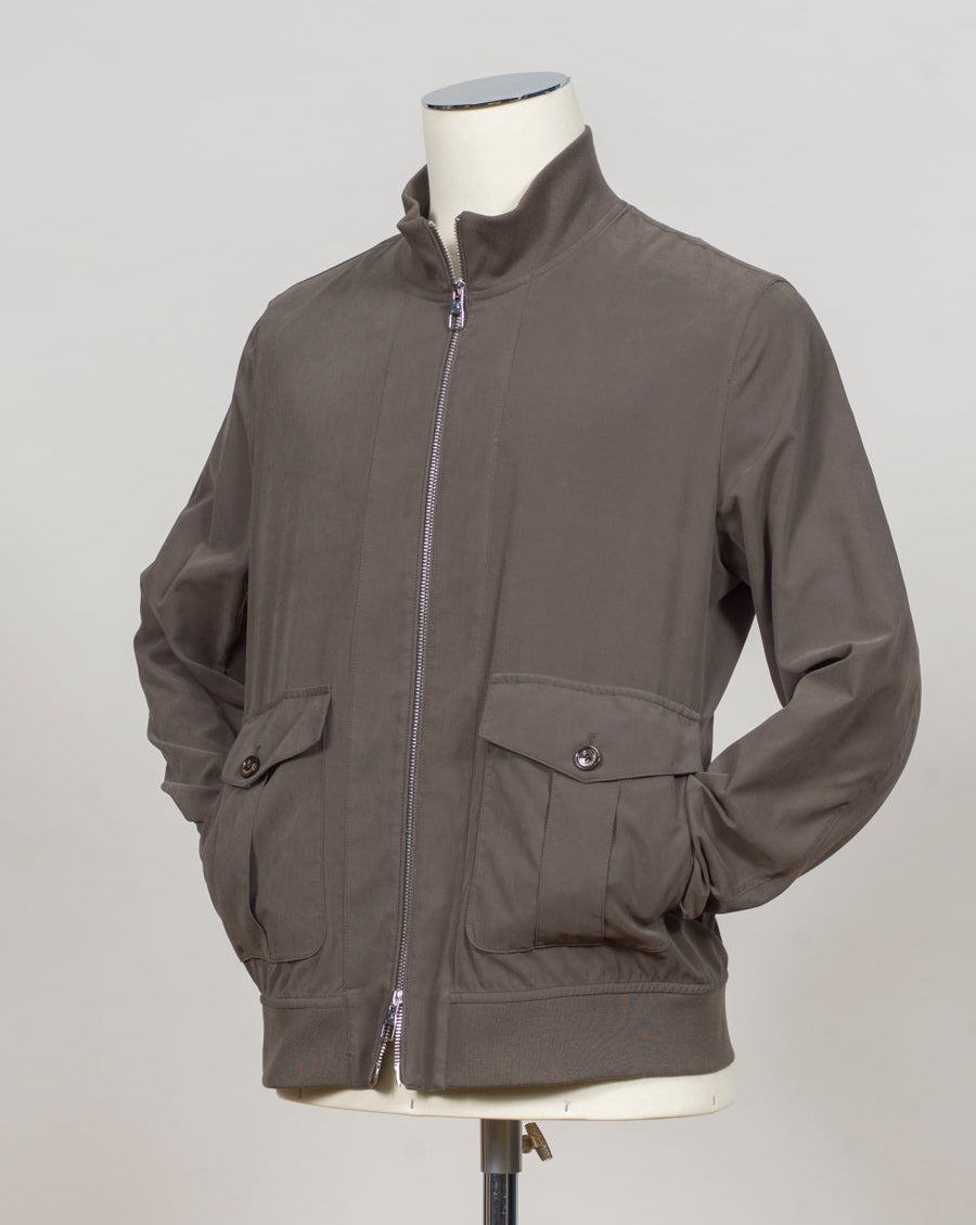 Composition: 87%PL 13%PA
Color: Military / 39
Article: S10MUC729-349
Two-way zip
Two buttoned pockets in front
Buttoned pockets inside
Ribbed collar, cuffs and hem
Unlined Montecore Technical Bomber Jacket / Military