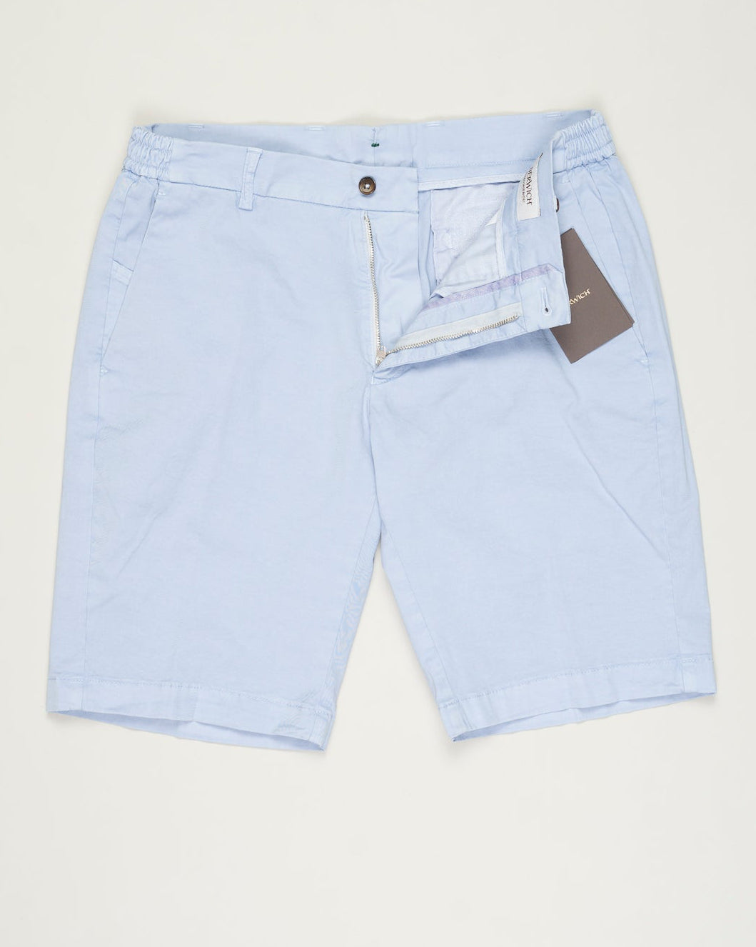 Model: ber_muda elax-GD
Article: ts0001x
Composition: 98% Cotton, 2% Elastane
Color: Light Blue / Lt Azzurro 75
Made in Martina Franca, Italy Berwich Garment Dyed Cotton Shorts / Light Blue