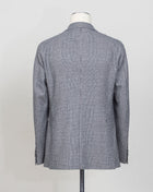 Unconstructed shoulder
Unlined
2 Buttons
Notch lapel
Patch pockets
Side vents
Flat front trousers
Belt loops
Slanted side pockets
2 back pockets
Modello: Monte Carlo / 2SHO22K01
Color: Grey / N3147'
Composition: 100% Super 100's Virgin Wool
Made in Martina Franca, Italy Tagliatore Glencheck Flannel Suit / Grey