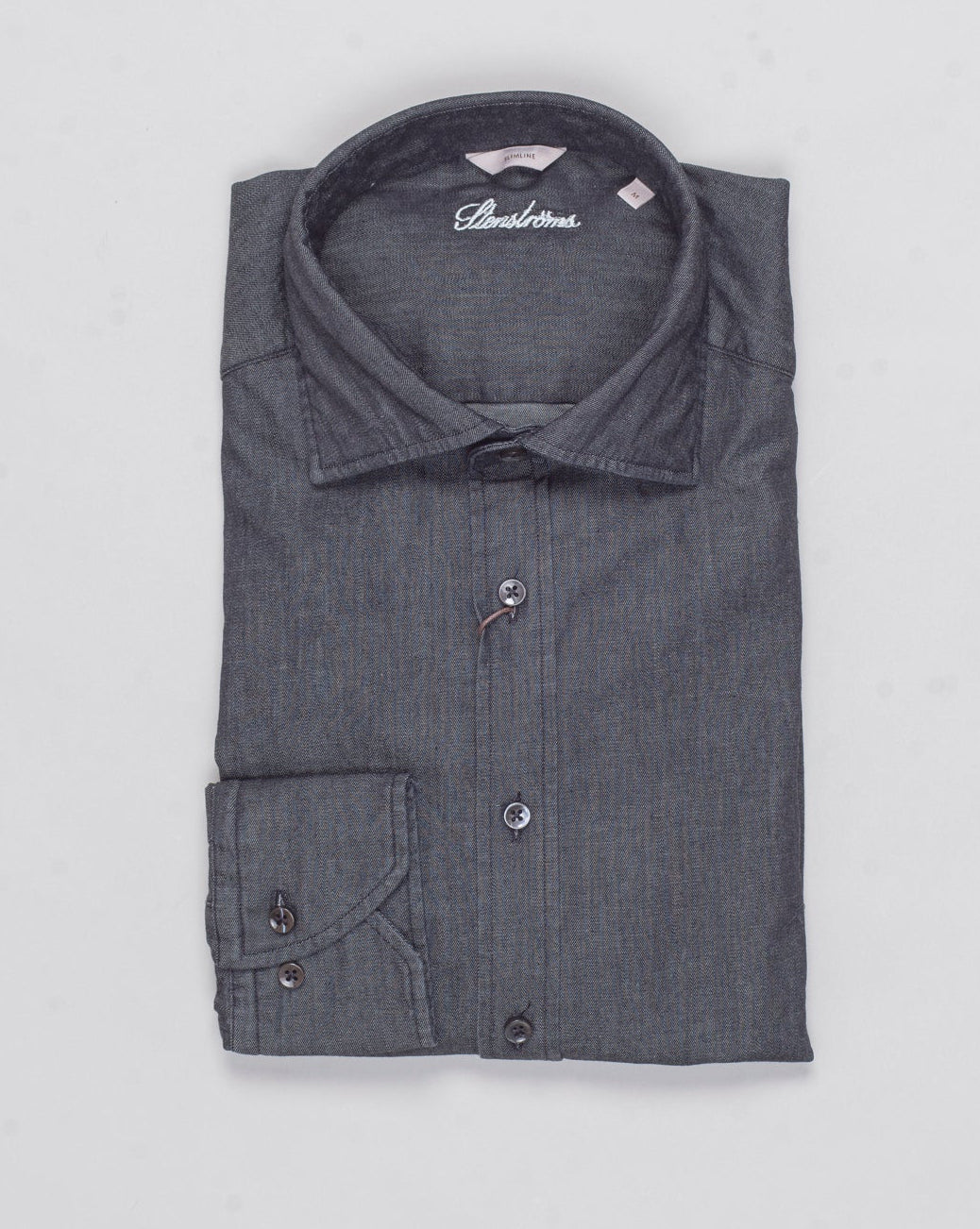 Slimline
Cut away collar
Single cuff
Mother of Pearl buttons
Composition: 98% Cotton 2% Elastan
Article: 7749217995
Color: 600 / Black Stenströms Casual Denim Stretch Shirt / Black
