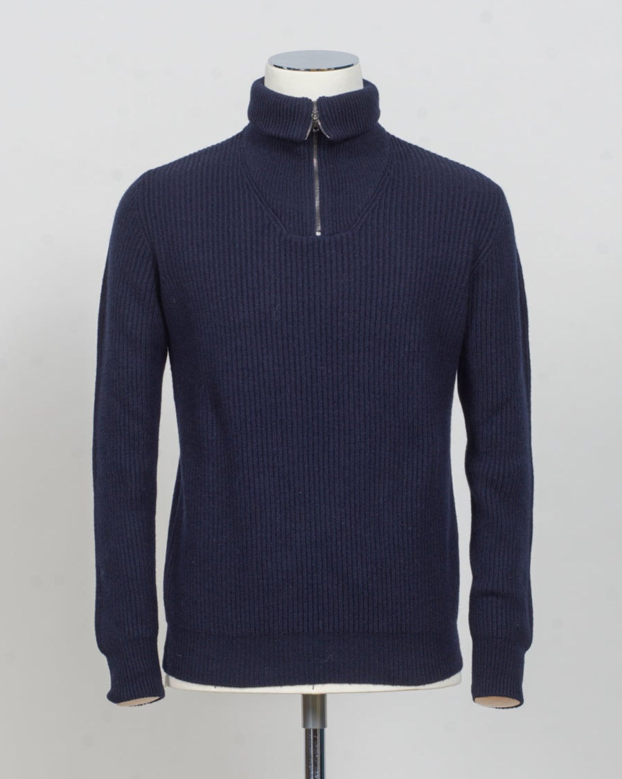 G.R.P. Firenze Ribbed Crewneck Knit
Col. Navy
Composition 90% wool 10% cashmere
Made in Italy G.R.P. Firenze Ribbed Half-Zip Knit / Navy