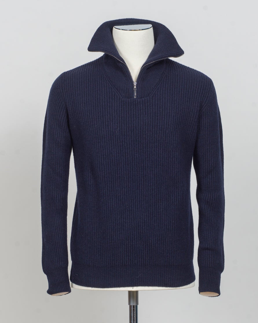 G.R.P. Firenze Ribbed Crewneck Knit
Col. Navy
Composition 90% wool 10% cashmere
Made in Italy G.R.P. Firenze Ribbed Half-Zip Knit / Navy