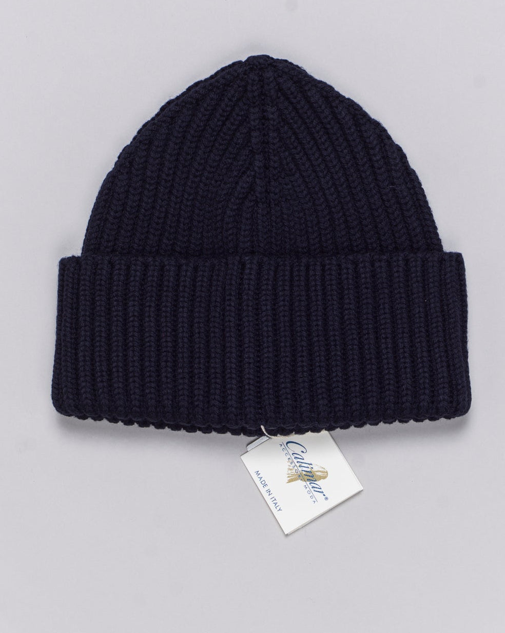 Composition: 100% Extrafine Merino Wool
Article: W23200
Color: Navy / 10215
Made in Italy Calimar Ribbed Merino Beanie / Navy
