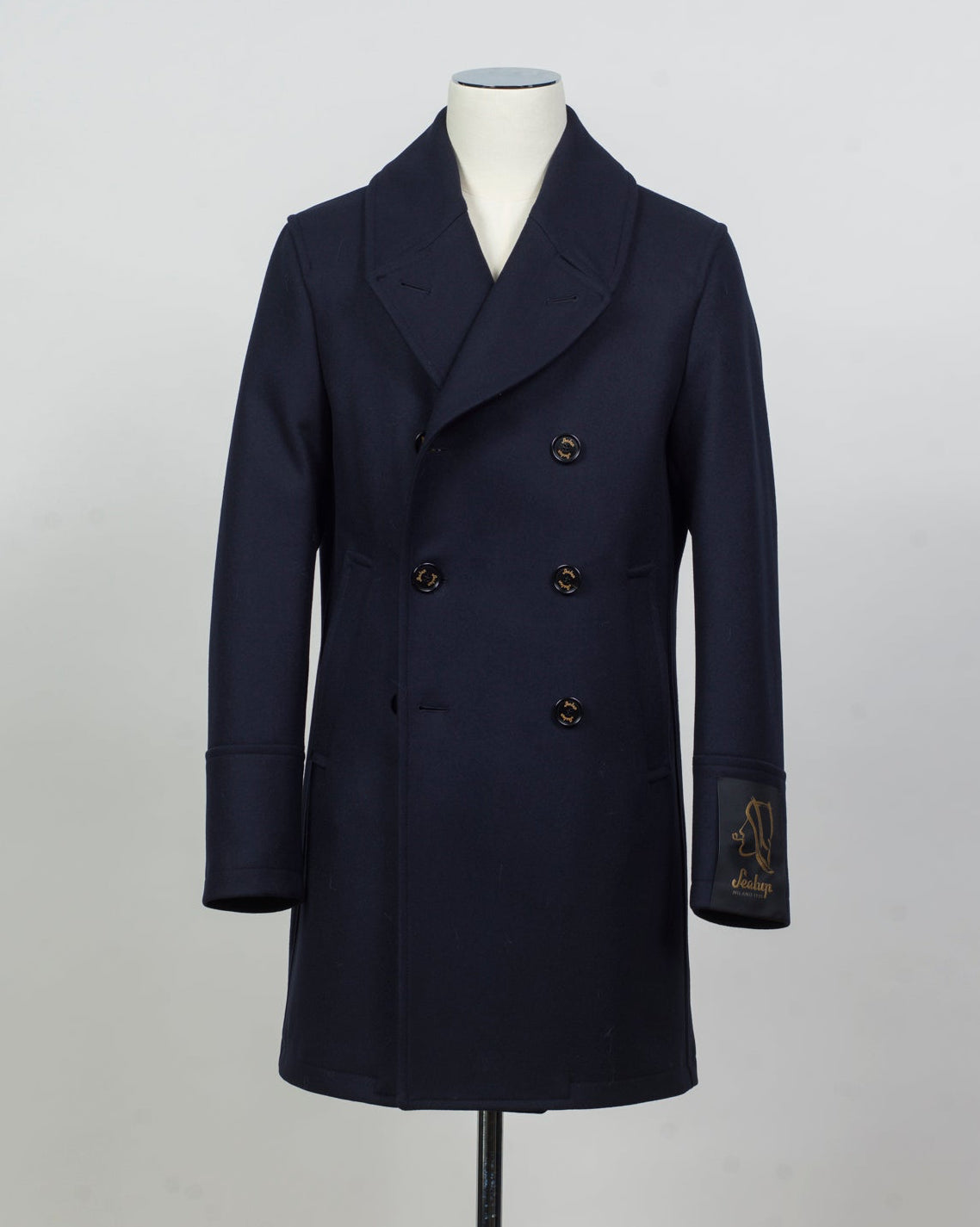 Back Length 92cm (Size 50)
Composition: 100% Wool
Lining: 100% Viscose
Padding: 100% Polyester
Model: 50092 Giaccone Genova Peacoat
Article: 7591
Color: 91 / Navy
Made in Italy Sealup Wool Peacoat / Navy