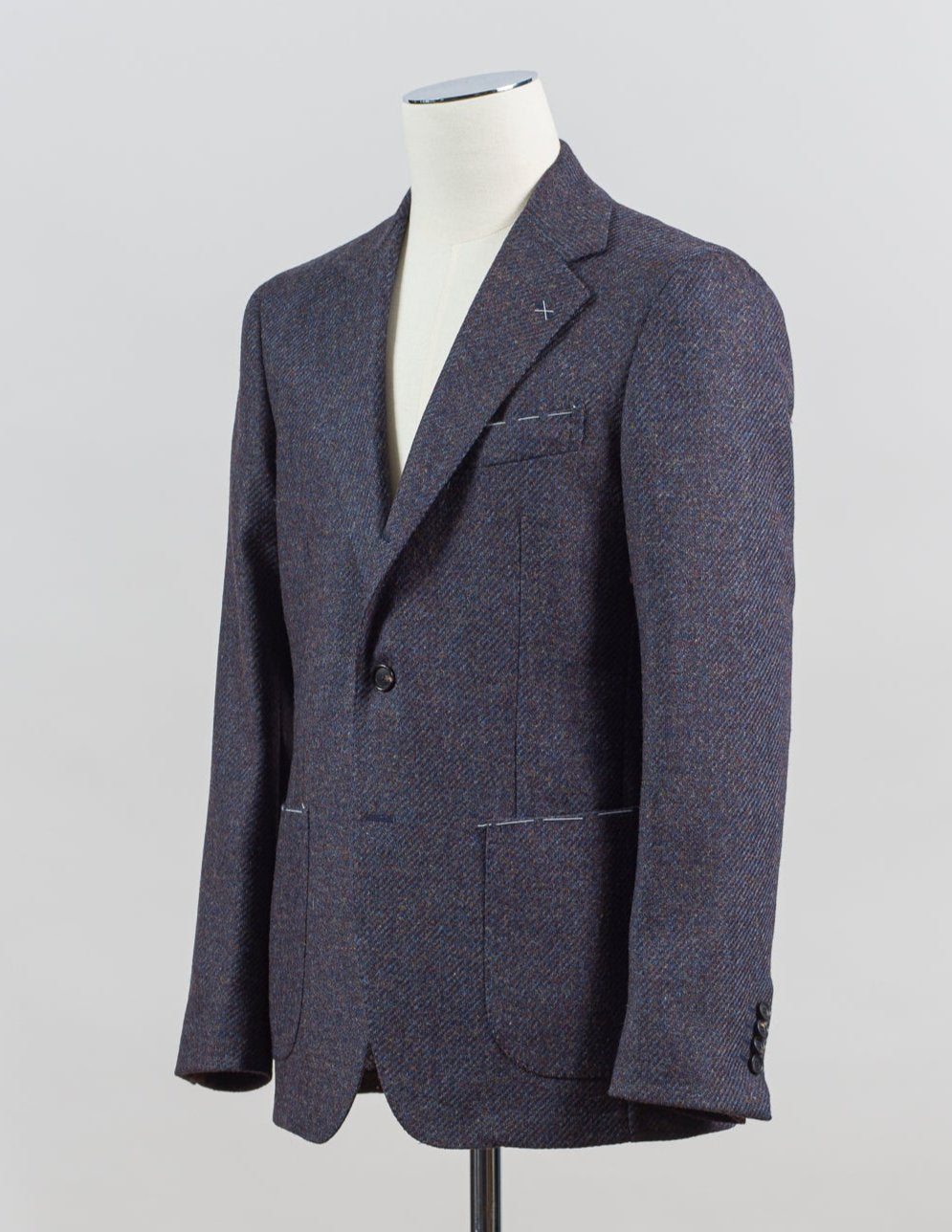 Patch pockets
Half lined
Unconstructed shoulder
Model: GJ02
Article: TW22114F
Color: 3390 / Blueberry/Brown
Composition: 100% Virgin Wool
Made in Italy Gaiola Tweed Jacket / Blueberry