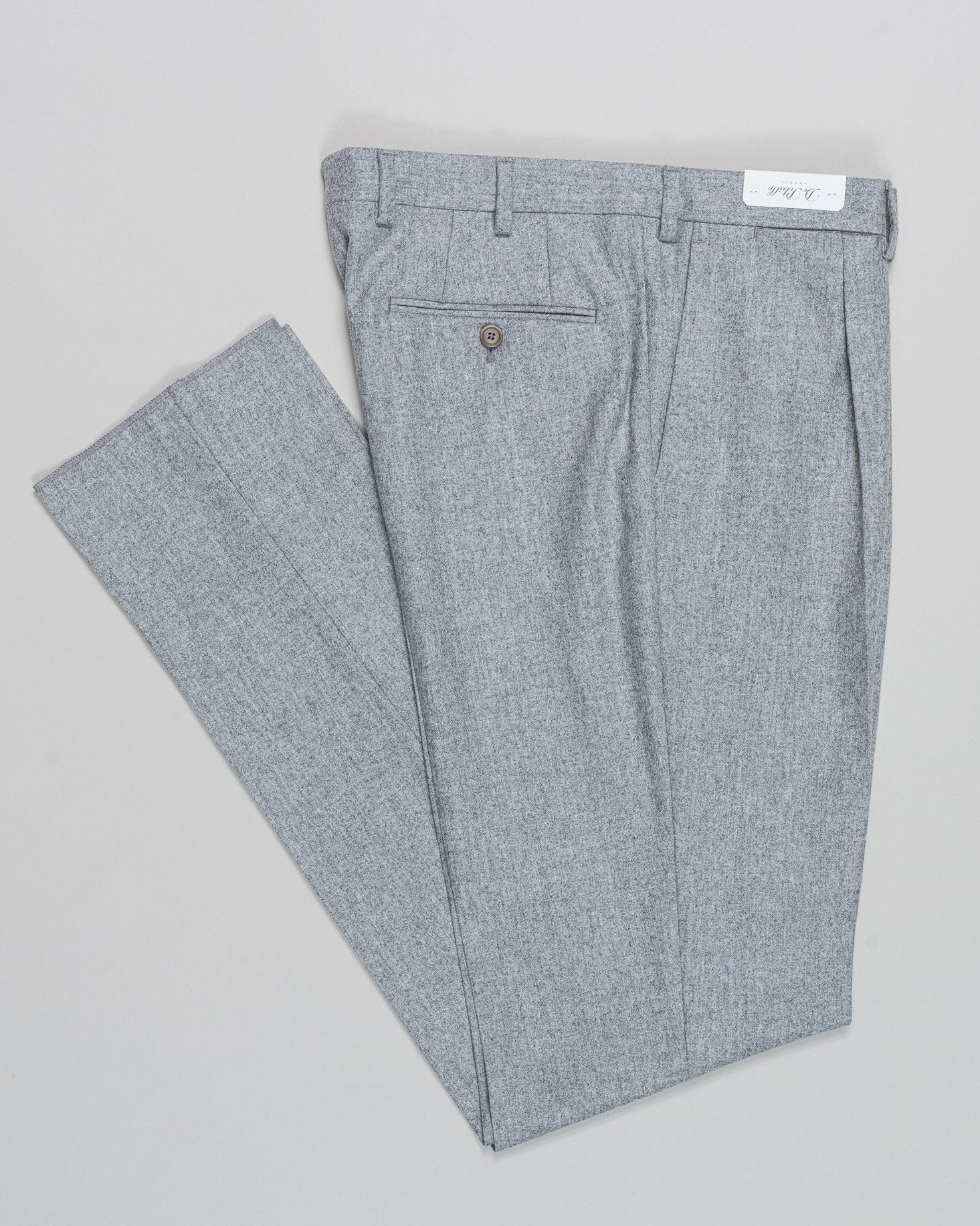 1 pleat
Unfinished hem (to be finished to desired length)
Belt loops
Model: B1P
Article: TP00704
Color: 4960 / Light Grey
Composition: 100% Virgin Wool
Made in Italy De Petrillo Flannel Trousers / Light Grey