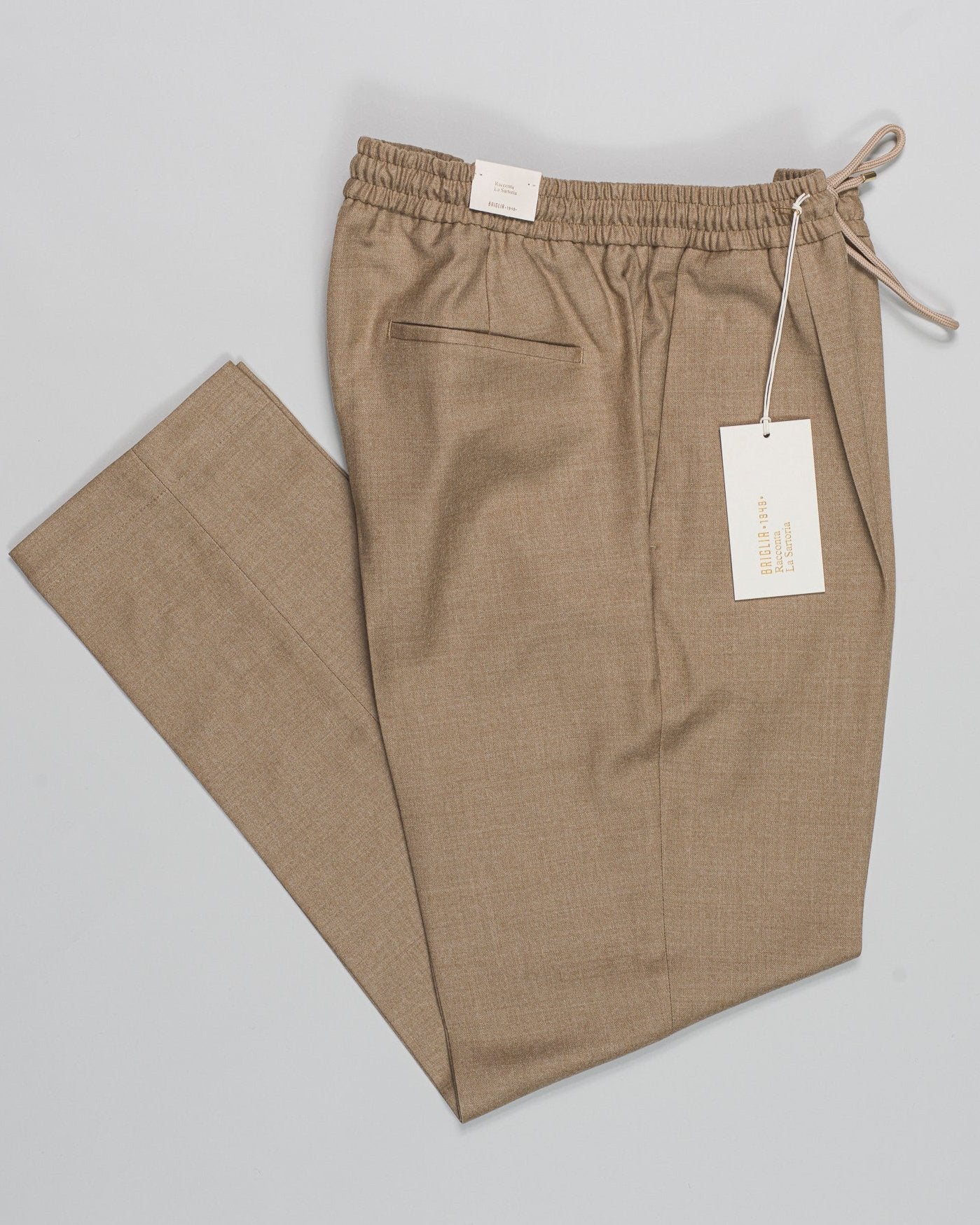 Article: 424120
Model: Wimbledons
Color: Beige / 33
Composition: 99% Virgin Wool 1% Elastan
One Pleat
Slanted side pockets
Drawstring waist
Made in Naples, Italy Briglia Drawstring Flannel Trousers / Beige